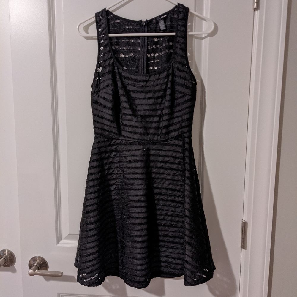Aqua sleeveless black dress